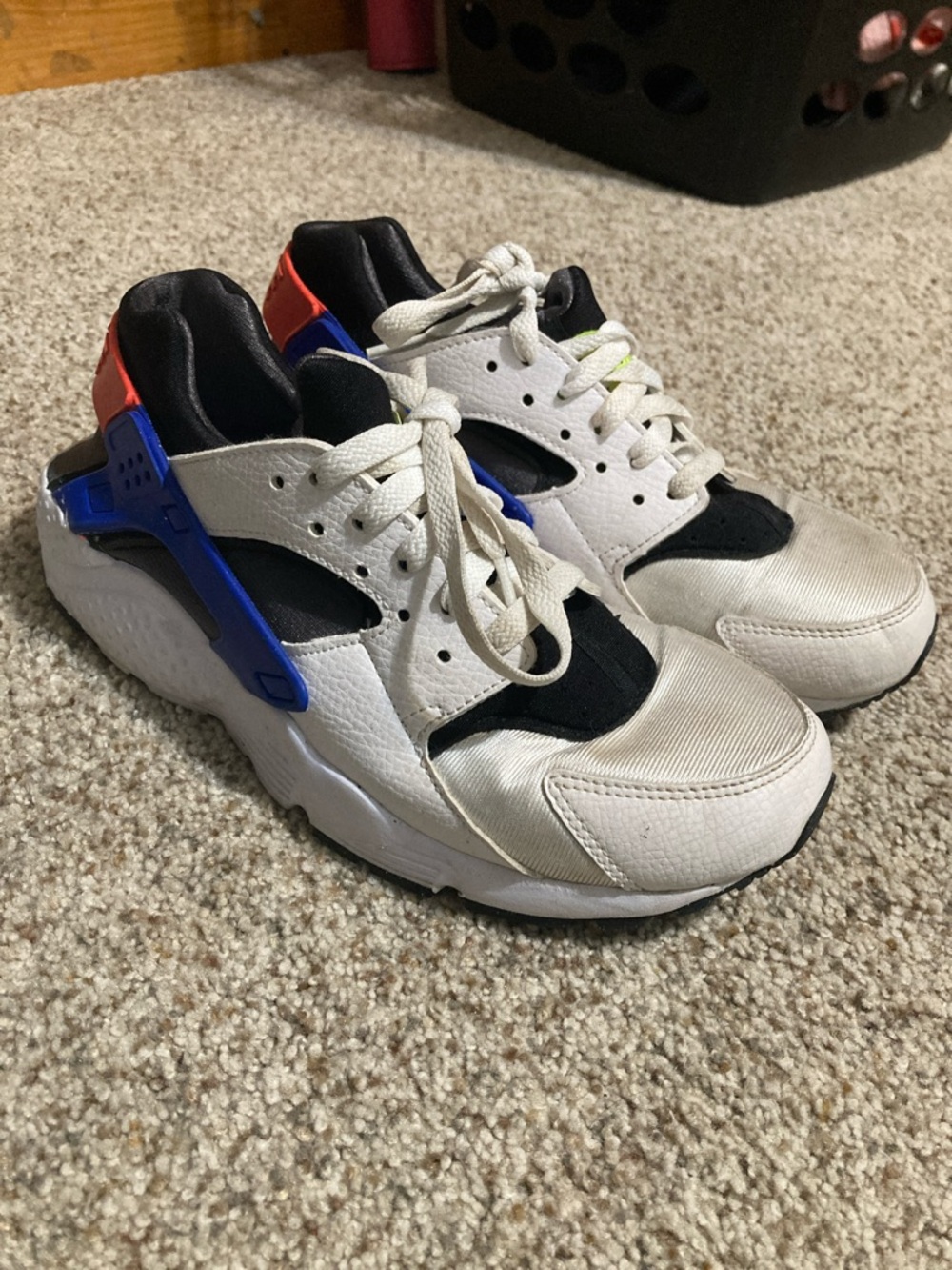Kids White and Black Nike Sneakers with Blue and Red Accents
